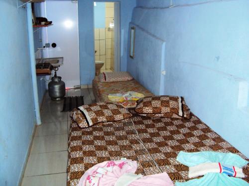 Ένα ή περισσότερα κρεβάτια σε δωμάτιο στο Suíte na Serra