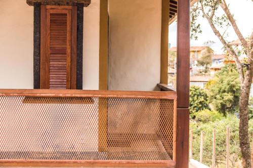 a view from the balcony of a house at Pé da Serra Suítes in Lavras Novas