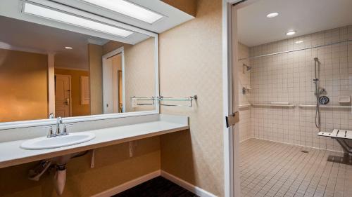 a bathroom with a sink and a shower at Best Western Plus Humboldt Bay Inn in Eureka