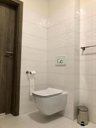 Koupelna v ubytování Apartament SŁONECZNY Pięć mórz Sianożęty