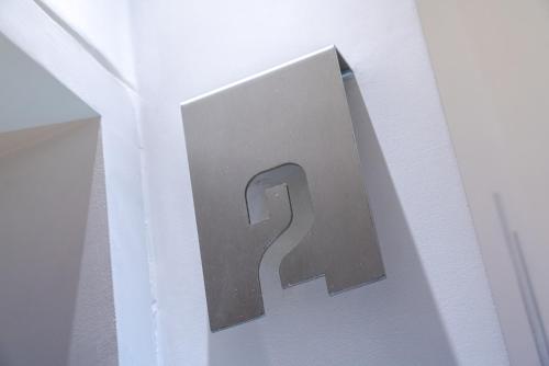 a number on a door in a room at Sta Catarina Design Apartments by Lisbon One in Lisbon