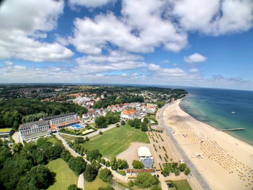 an aerial view of the shoreline of a beach at Blue City Apartments in Lübeck