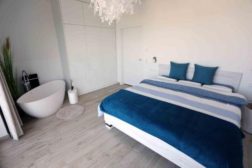Postel nebo postele na pokoji v ubytování Penthousewohnung Kapkieker
