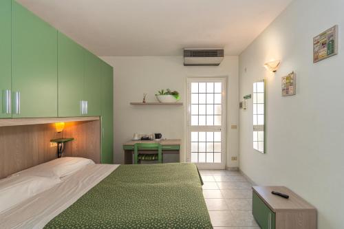 Katil atau katil-katil dalam bilik di Hotel Mariani