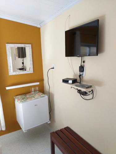 TV a/nebo společenská místnost v ubytování Suíte Ipê Amarelo em Provetá, Ilha Grande