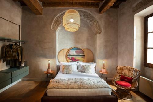 Cama o camas de una habitación en Palm Suites - Small Luxury Hotels of the World