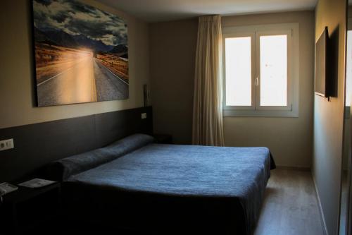 Postel nebo postele na pokoji v ubytování Hotel Nacional