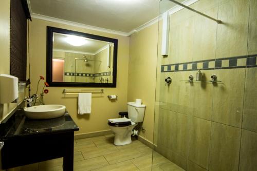 Un baño de Villa Le View Guesthouse