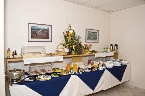 a blue and white table with food on it at Sea-View Zum Sperrgebiet in Lüderitz