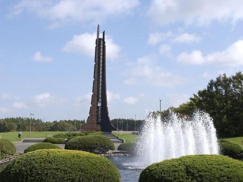 a fountain in front of a monument in a park at Hotel Wing International Sapporo Susukino in Sapporo