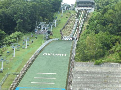 an overlook of an amusement park with a train on the tracks at Hotel Wing International Sapporo Susukino in Sapporo
