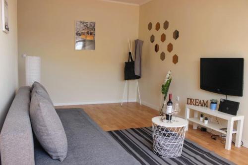 TV a/nebo společenská místnost v ubytování Lisboa Tejo in Cacilhas - New Apartment