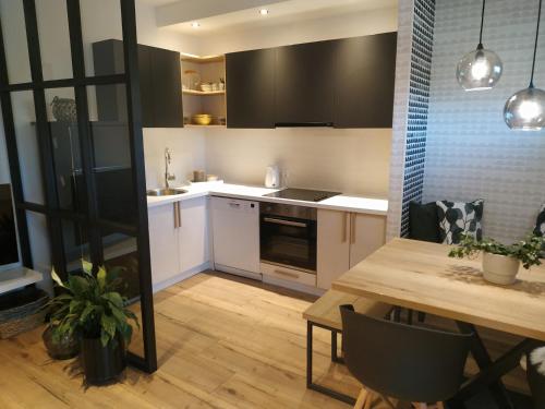 Una cocina o cocineta en Avisi Home