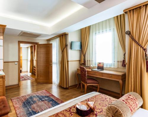Ένα ή περισσότερα κρεβάτια σε δωμάτιο στο Hotel Sultania Boutique Class