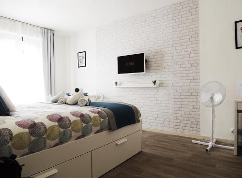 Ένα ή περισσότερα κρεβάτια σε δωμάτιο στο Appart'AZUR Haguenau - Centre Grand'Rue - Logements entiers pour voyageur pro