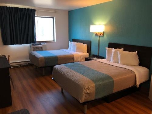 Ένα ή περισσότερα κρεβάτια σε δωμάτιο στο Motel 6-La Crosse, WI