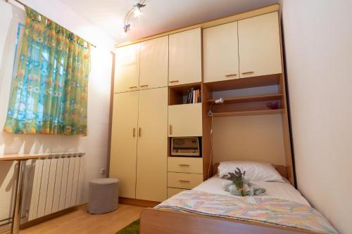 Postel nebo postele na pokoji v ubytování Apartment Orange