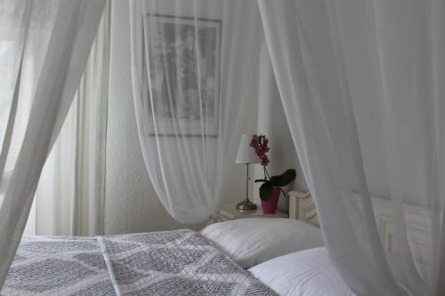 Voodi või voodid majutusasutuse Hotel Simonis toas