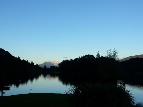 a view of a river with mountains in the background at Ferienhof Kampfl in Fügen