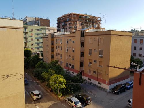 an aerial view of a parking lot with buildings at Casatua in Taranto