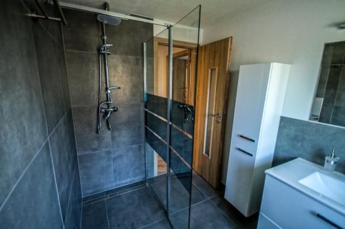 Koupelna v ubytování ARESKO-APARTMENTS