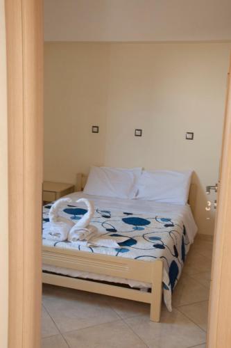Postel nebo postele na pokoji v ubytování Minas-Maria House