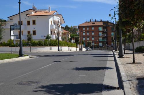 an empty street in a city with buildings at B&B Sperlonga in Sperlonga