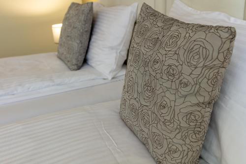 Postel nebo postele na pokoji v ubytování Hotel IUT