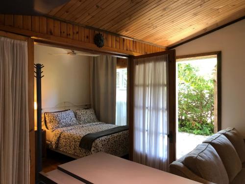 Giường trong phòng chung tại Chalets et Studios Le Vent Du Nord