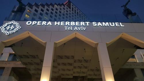 a sign for the opera herbert samibel hotel at Herbert Samuel Opera Tel Aviv in Tel Aviv