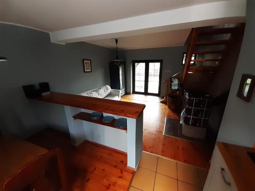 an overhead view of a living room with a couch at Natura Apartamenty in Swaderki