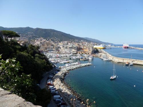 a harbor with a bunch of boats in the water at Chambres d'hôtes Villa bella fiora in Biguglia