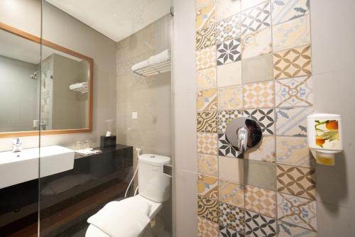 Ένα μπάνιο στο Kokoon Hotel Surabaya