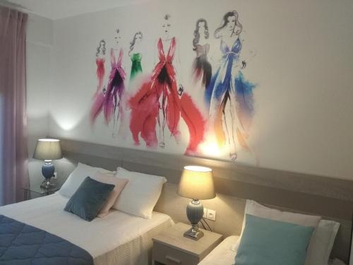 Katil atau katil-katil dalam bilik di Divine Luxury Apartments