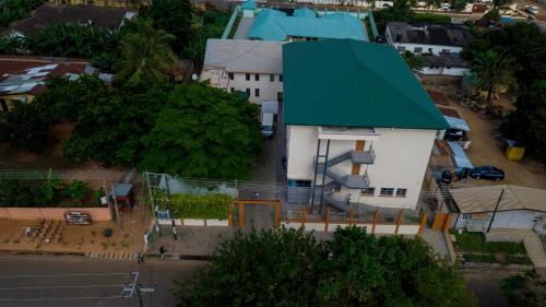 an overhead view of a building with a green roof at Monarch Hotel in Accra
