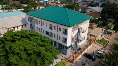 an overhead view of a building with a green roof at Monarch Hotel in Accra