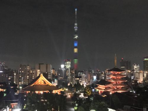 a view of the tokyo tower at night at Onyado Nono Asakusa Natural Hot Spring in Tokyo