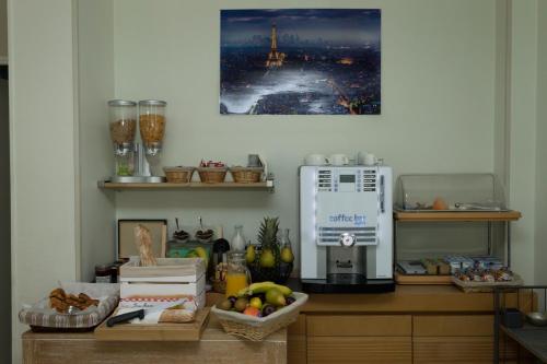Kuchyň nebo kuchyňský kout v ubytování Hôtel de Paris La Défense