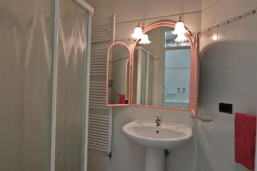 a bathroom with a sink and a mirror at Villa Durante in Cagli