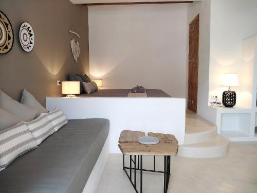 a living room with a couch and a table at STELLA MARINA in Panteli