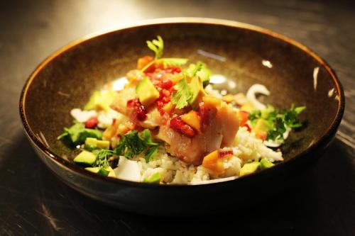 a bowl filled with rice and meat and vegetables at ibis Paris Bercy Village in Paris