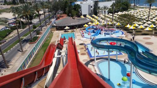an aerial view of a water slide at a water park at Gai Beach Hotel in Tiberias