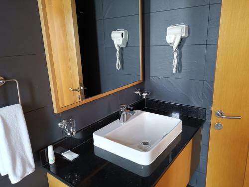 Een badkamer bij K Hotels Entebbe
