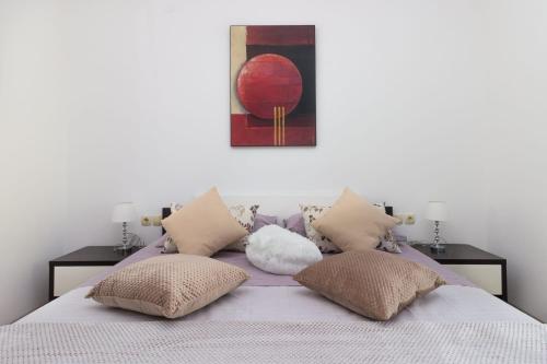 Ένα ή περισσότερα κρεβάτια σε δωμάτιο στο Sea View Apartments with jaccuzzi