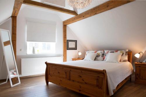 Un pat sau paturi într-o cameră la Lampenhäuschen