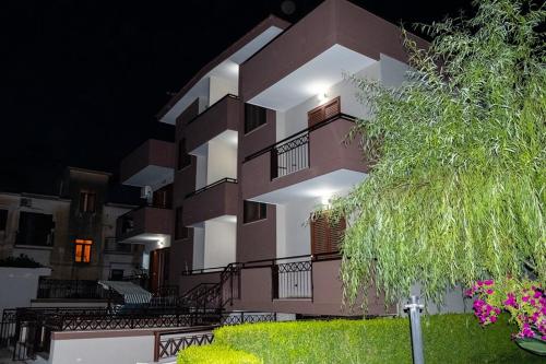 a large building with lights on the side of it at ALMI B&B in Sarno
