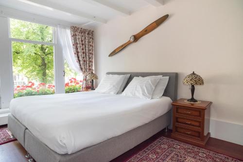 Een bed of bedden in een kamer bij Keizershouse Amsterdam