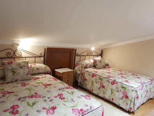 Кровать или кровати в номере Hostería Carmen