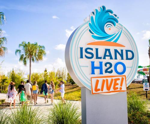 a sign for island live at a beach at Margaritaville Resort Orlando with H2O Waterpark in Kissimmee