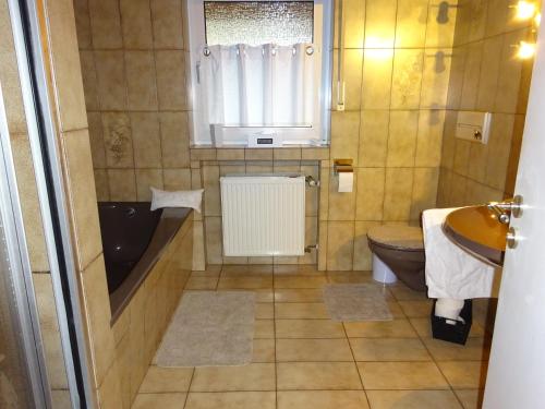 Koupelna v ubytování Ferienhaus mit Kamin